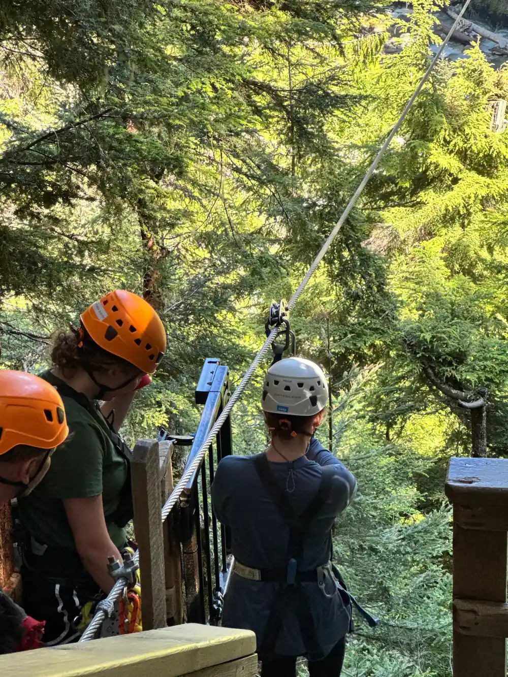 Guides checking a harness at the platform