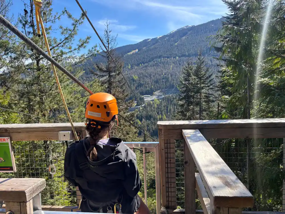 A rider at the platform rail looking out