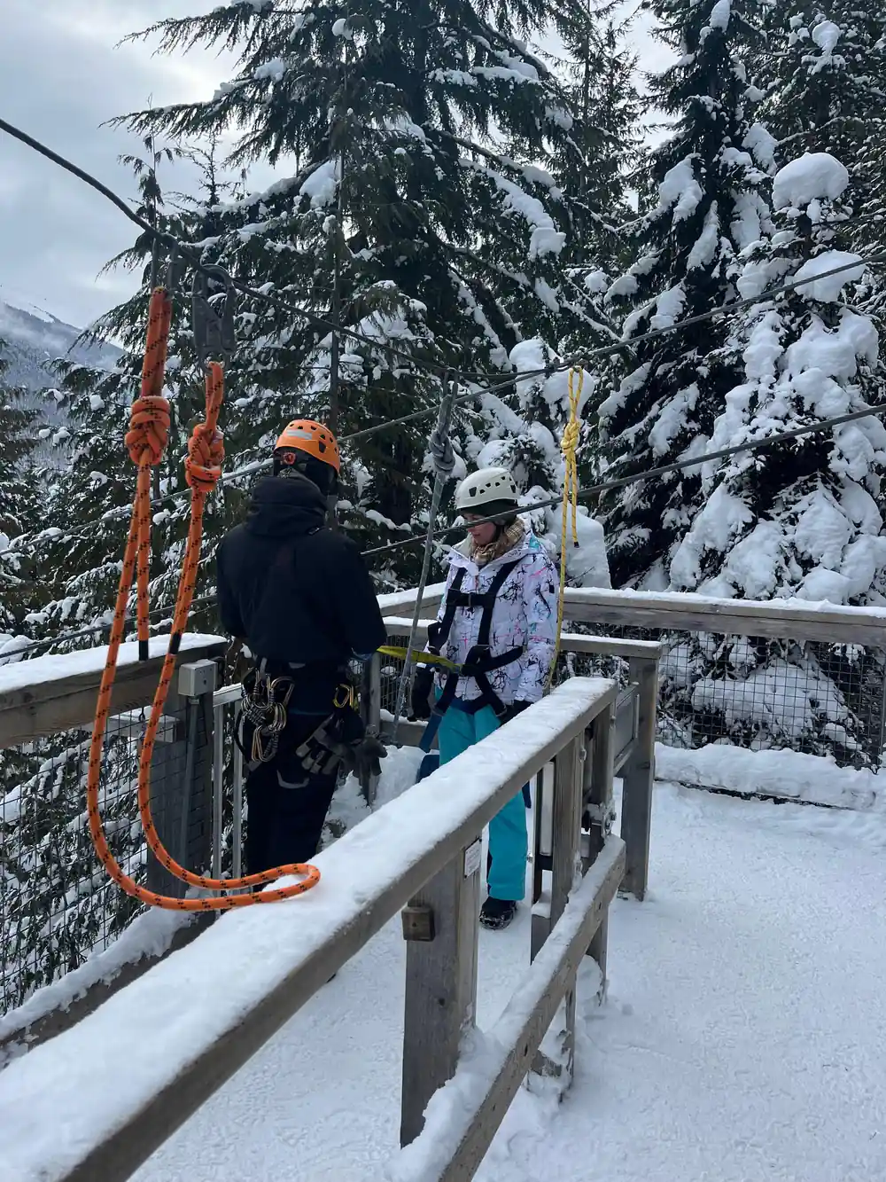Staff and a rider on a snowy platform