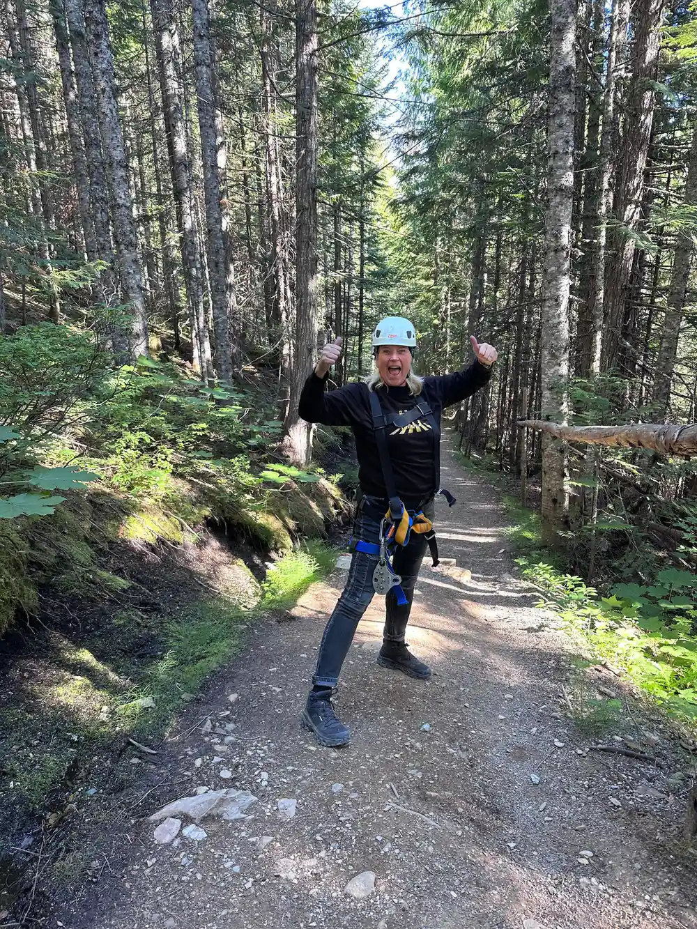 A walker on the forest trail between the lines